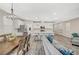 Open-concept living space featuring a well-equipped kitchen, dining area, and comfortable seating at 3164 Bormida Ave, Henderson, NV 89044