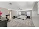 Large main bedroom with carpeted floor, ceiling fan, and two large windows at 3164 Bormida Ave, Henderson, NV 89044