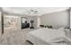 Large main bedroom with carpeted floor, ceiling fan, and adjacent bonus room at 3164 Bormida Ave, Henderson, NV 89044