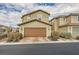Beautiful home featuring manicured landscaping, a spacious two-car garage, and a welcoming facade at 3177 Bivona Walk, Henderson, NV 89044