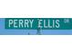 Street sign displaying 'PERRY ELLIS DR' against a clear blue sky at 327 Perry Ellis Dr, Henderson, NV 89014