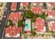 An aerial shot captures red-roofed homes surrounding a pool, offering a tranquil oasis within the community and ample parking at 3740 Desert Marina Dr # 3, Laughlin, NV 89029