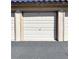 A closed single-car garage with number 3 marked above the door at 3740 Desert Marina Dr # 3, Laughlin, NV 89029