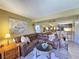 Relaxing living room featuring a large sectional sofa with seamless flow into the kitchen at 3740 Desert Marina Dr # 3, Laughlin, NV 89029