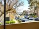 Charming street view overlooking a tree-lined road and residences with a water view beyond at 3740 Desert Marina Dr # 3, Laughlin, NV 89029