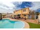 Large backyard featuring a pool, barbecue, patio, and a storage shed at 4322 Satinwood Dr, Las Vegas, NV 89147