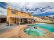 Spacious backyard features a pool, hot tub, basketball court, and outdoor furniture at 4322 Satinwood Dr, Las Vegas, NV 89147