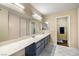 Bathroom with double sinks, large mirror, vanity and separate shower area at 4322 Satinwood Dr, Las Vegas, NV 89147