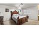 Bright bedroom features a decorative bed frame, neutral walls, and natural light at 4322 Satinwood Dr, Las Vegas, NV 89147