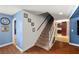 Hallway featuring hardwood floors and leading to carpeted stairs at 4322 Satinwood Dr, Las Vegas, NV 89147