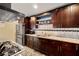 Modern kitchen featuring stainless steel appliances, and granite countertops at 4322 Satinwood Dr, Las Vegas, NV 89147