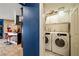 A bright laundry room offers a washer and dryer for convenience at 4322 Satinwood Dr, Las Vegas, NV 89147