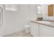 Bright bathroom featuring white cabinetry and a well-lit countertop at 4439 Yellow Harbor St, Las Vegas, NV 89129