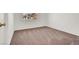 Carpeted bedroom with window view and ample natural light at 4439 Yellow Harbor St, Las Vegas, NV 89129