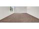 Open bedroom with a neutral color scheme, filled with natural light at 4439 Yellow Harbor St, Las Vegas, NV 89129