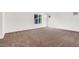 Open bedroom with a neutral color scheme, filled with natural light at 4439 Yellow Harbor St, Las Vegas, NV 89129