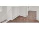 Carpeted hallway with white walls and trim leading to bedrooms at 4439 Yellow Harbor St, Las Vegas, NV 89129