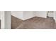Hallway with carpet and white trim leads to the bedrooms and bathroom at 4439 Yellow Harbor St, Las Vegas, NV 89129
