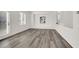 Cozy living room showcasing stylish flooring and an abundance of natural light at 4439 Yellow Harbor St, Las Vegas, NV 89129