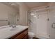 Full bathroom featuring a glass-enclosed shower, modern fixtures, and a single sink vanity at 6075 Belvedere Canyon Ave, Las Vegas, NV 89139