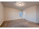 Cozy bedroom with neutral carpet, a single window, and a standard closet at 6075 Belvedere Canyon Ave, Las Vegas, NV 89139