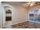 Flex room with tile flooring and a glass sliding door at 6075 Belvedere Canyon Ave, Las Vegas, NV 89139
