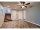 Living room with stairs and tile flooring at 6075 Belvedere Canyon Ave, Las Vegas, NV 89139