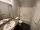 A full bathroom with a tub and shower and a granite countertop vanity at 6800 E Lake Mead Blvd # 1018, Las Vegas, NV 89156