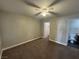 Bedroom with neutral paint and carpet, a ceiling fan, and ensuite bathroom at 6800 E Lake Mead Blvd # 1018, Las Vegas, NV 89156
