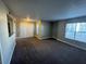Spacious living room with neutral paint and carpet, and lots of natural light at 6800 E Lake Mead Blvd # 1018, Las Vegas, NV 89156