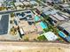 A new construction home with a pool, sport court, and desert landscape with privacy wall at 7222 Pulsar Mesa Ct, Las Vegas, NV 89148