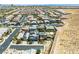 Beautiful community aerial showcases modern homes with desert landscaping, solar panels, and close proximity to city amenities at 7222 Pulsar Mesa Ct, Las Vegas, NV 89148