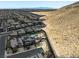 Stunning aerial view of desert home featuring a pool and landscaped backyard adjacent to a natural desertscape at 7222 Pulsar Mesa Ct, Las Vegas, NV 89148