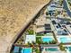 A desert community home with a pool, sport court, desert landscape and privacy wall at 7222 Pulsar Mesa Ct, Las Vegas, NV 89148