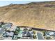 Desert community home with a pool and sport court on a sunny day with mountain views at 7222 Pulsar Mesa Ct, Las Vegas, NV 89148
