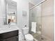 Bright bathroom features a walk-in shower, modern vanity, and stylish neutral design elements at 7222 Pulsar Mesa Ct, Las Vegas, NV 89148