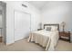 Cozy bedroom with closet, plush carpet, neutral palette and ambient lighting at 7222 Pulsar Mesa Ct, Las Vegas, NV 89148