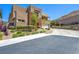 Lovely two-story home with a desert-landscaped yard, balcony, and three-car garage at 7222 Pulsar Mesa Ct, Las Vegas, NV 89148