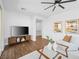 Living room with wood floors offers an open floor plan and modern features at 7222 Pulsar Mesa Ct, Las Vegas, NV 89148