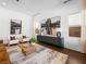 Bright living room with hardwood floors, neutral walls, and stylish decor at 7222 Pulsar Mesa Ct, Las Vegas, NV 89148