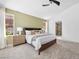 Spacious main bedroom featuring modern decor, large windows, and a serene, relaxing atmosphere at 7222 Pulsar Mesa Ct, Las Vegas, NV 89148