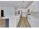 Beautiful kitchen with white cabinets, stainless steel appliances, and a large island at 8043 Tank Loop St, Las Vegas, NV 89166