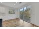 Bright living space with modern finishes, large glass sliding doors leading to a backyard at 8043 Tank Loop St, Las Vegas, NV 89166