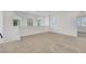 Loft area with neutral carpet and bright windows at 8043 Tank Loop St, Las Vegas, NV 89166