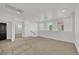 Spacious loft area featuring neutral carpet, ample lighting, and an open layout at 8043 Tank Loop St, Las Vegas, NV 89166