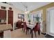 Bright dining area with natural light and a view of the backyard at 8217 Ashkum Ave, Las Vegas, NV 89149