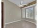 Dining room area with tile flooring, shuttered windows for natural lighting, and a ceiling fan at 8217 Ashkum Ave, Las Vegas, NV 89149