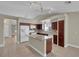 Well-designed kitchen with an island, stainless steel appliances, and easy access to adjacent living spaces at 8217 Ashkum Ave, Las Vegas, NV 89149