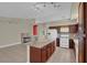 Inviting kitchen with an island, modern appliances, and an open layout flowing into the living area at 8217 Ashkum Ave, Las Vegas, NV 89149