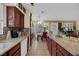 Bright kitchen and dining space with granite countertops and sleek appliances at 8217 Ashkum Ave, Las Vegas, NV 89149
